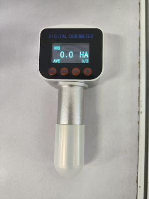 Digital Display Shore Hardness Tester dengan resolusi 0.1 Shore ≤1 Shore Error dan ukuran kompak 150mm × 60mm × 50mm